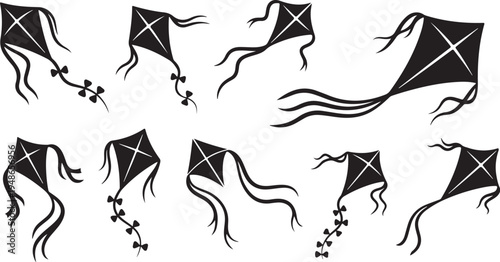 Black Kites Flying in the Sky with Tails Attached