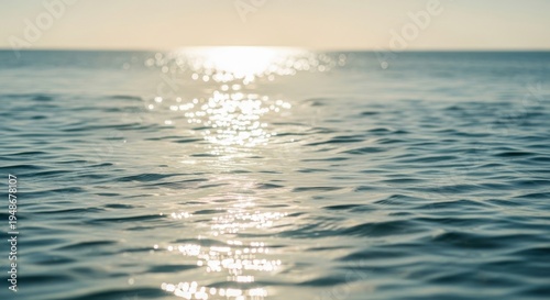 Sparkling Sunlight Reflects on Gentle Ocean Waves Creating a Mesmerizing Aquatic Display