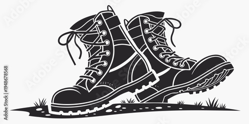 a pair of hiking boots with laces and thick soles Vector