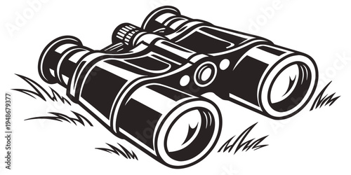 a pair of binoculars sitting in the grass Vector