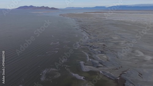 Aerial view of Great Salt Lake shoreline and Antelope Island in Utah