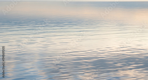 Calm blue water with gentle ripples reflecting light ocean waves