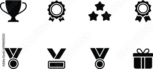 Achievement and award solid icons set featuring trophy medal winner stars and gift box