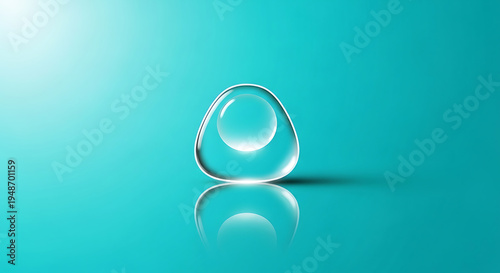 Teardrop shaped clear contact lens on reflective surface transparent