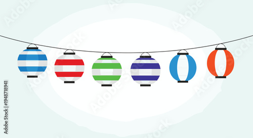 Vibrant string of traditional paper lanterns in various colors like blue, red, green, and orange used for festive celebrations and night festivals.