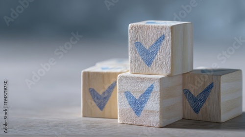 Wallpaper Mural The wooden blocks with blue checkmarks symbolizing approval, quality and success on a table Torontodigital.ca