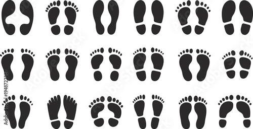 Collection of black footprints and sole imprints in various arrangements on white footstep mark