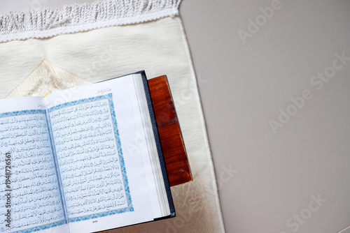 Wallpaper Mural The holy Quran on a rehal, capturing a serene atmosphere of devotion Torontodigital.ca