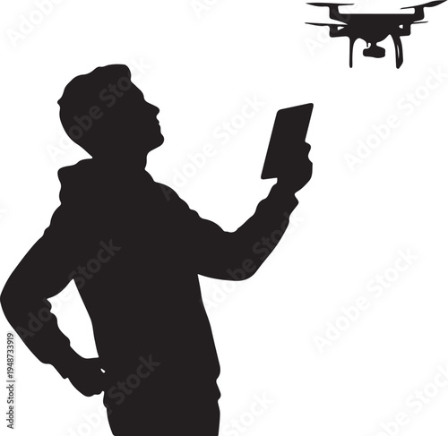 Silhouette of a Person Flying a Drone Using a Tablet Remote Control