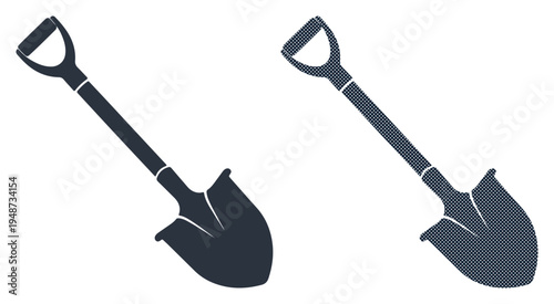 Two dark shovels ready for garden work and digging