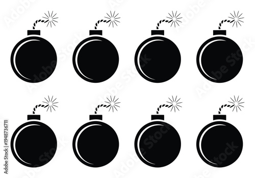 Eight Black Cartoon Bombs with Fuses Lit on a White Background