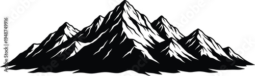 Dramatic jagged mountain range silhouette with sharp peaks and valleys at dusk