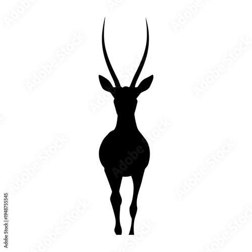 Silhouette of an Oryx Antelope Standing Facing Forward.