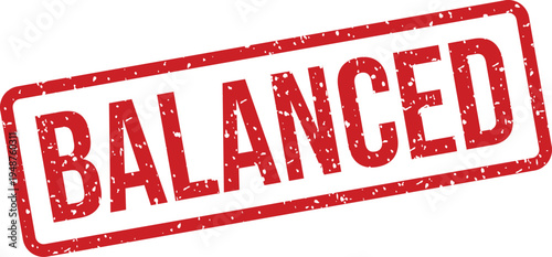 A vibrant red grunge textured rubber stamp displays the word balanced signifying equilibrium or fairness