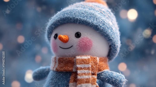 Snowman wearing winter hat and scarf close up festive holiday concept