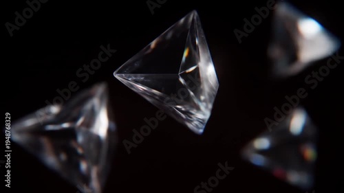 Transparent geometric shapes floating against a dark background
