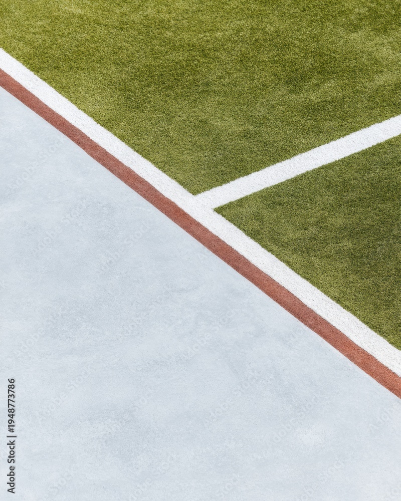 Fototapeta premium Empty Sports Field with Green Grass and White Markings Close Up Detail showing Turf and Border at an Outdoor Complex for Athletic Training Background