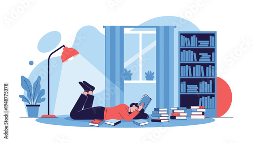 Young woman lying on her stomach on a blue rug reads a book intently while surrounded by many stacks of literature.