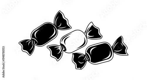 Black and White Candies Wrapped in Twists, Isolated on White Background