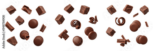: Dark chocolate pieces, chunks, and shavings isolated on white background.