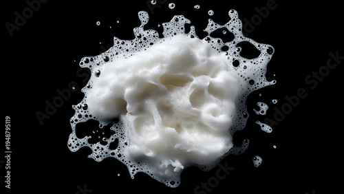 white soap foam splash isolated on black background