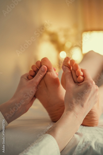 Photography Professional reflexology foot massage in a peaceful spa setting