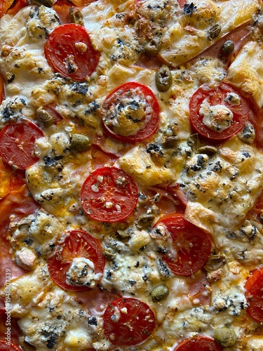 Pizza with roquefort tomatoes and ham