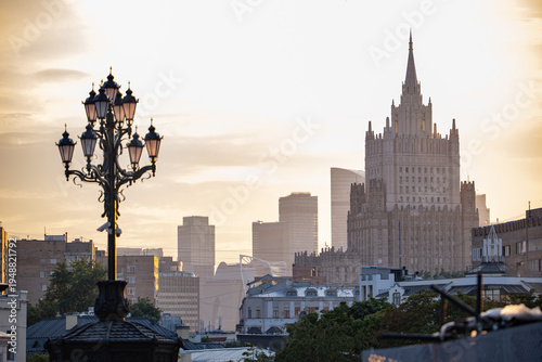 Fotografie Moscow sunset with Ministry of Foreign Affairs building and historic streetlight
