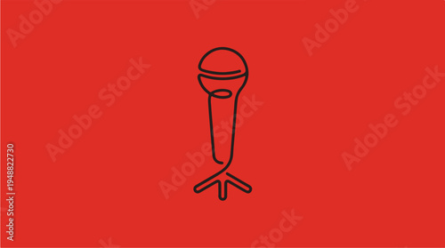Microphone on red background.