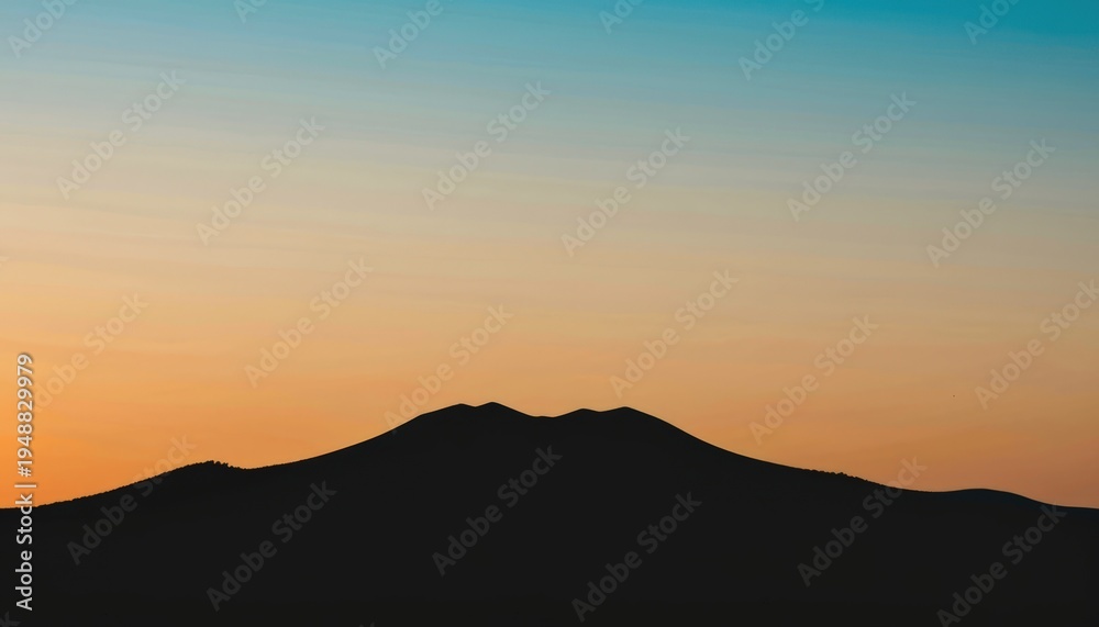 Obraz premium Silhouette of Mountain at Sunset