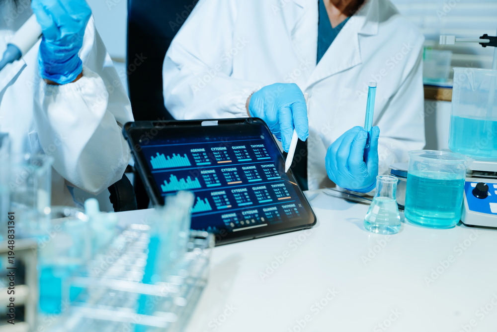 Fototapeta premium Medical scientists performing biotechnology laboratory research with DNA molecular analysis, microscope testing and digital healthcare technology