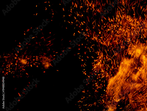 A black background with a lot of fire and smoke
