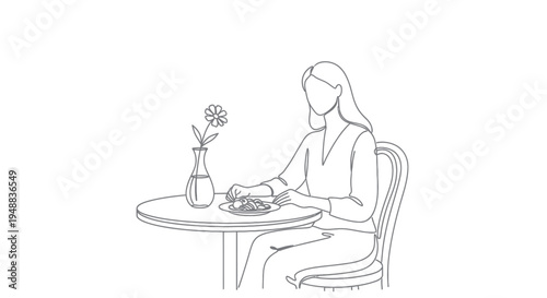 Woman sitting at a table eating.