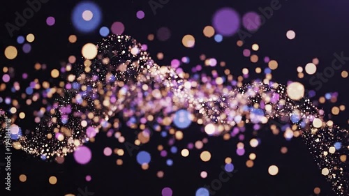 Vibrant colorful particles swirl and flow dynamically across a dark background