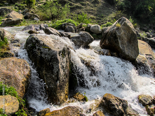 Abundant Mountain Stream flowing over rocks at Nagling, Darma Valley, Uttarakhand, India