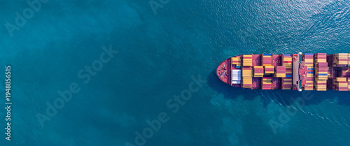 Aerial view from drone, Container ship or cargo shipping business logistic import and export freight transportation by container ship in open sea, Container loading cargo freight ship boat.