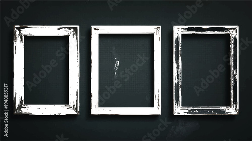Three Empty Distressed White Picture Frames Hanging Against a Dark Background Wall