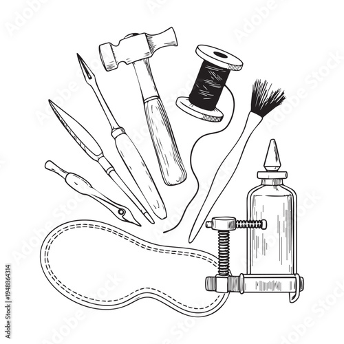 Black and white of leatherworking tools and hammer stitching chisel