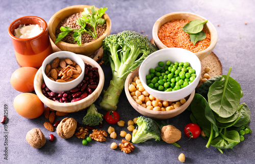 Obraz na płótnie Healthy plant based protein foods assortment with legumes nuts vegetables and eg