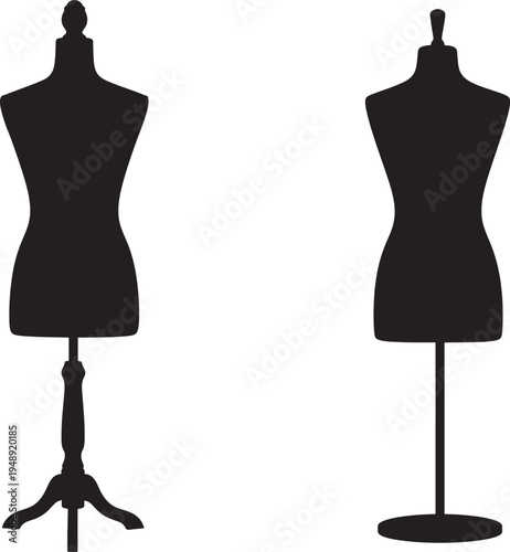 Two black dressmaker's mannequins on stands in silhouette