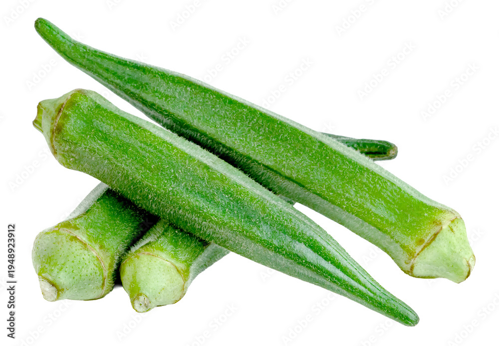 Naklejka premium A group of four fresh green okra pods stacked together on a clean. Healthy raw organic vegetables shown in a studio shot, ideal for food, cooking, and nutrition concepts.