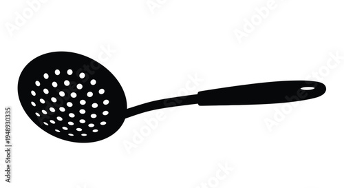 Black slotted spoon isolated on white a striking silhouette