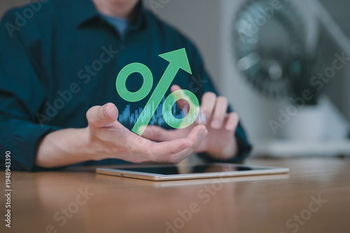 Businessman holding virtual arrow up percentage in business growth concept, investor studying real estate market trends real estate investment concept energy efficiency rating and property value