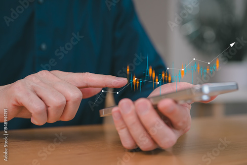 investment stock market data analysis concept, businessman using smartphone analyst virtual trading graph, trading online, financial mobile application platform