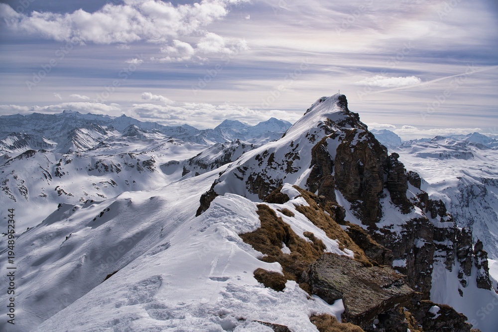 Obraz premium Ski ascent of Hochgamatsch mountain in the Sarganserland region of Heidiland. With views of the Hochfinsler. Ski tour in the Swiss Alps with a fantastic mountain panorama. Ski mountaineering.