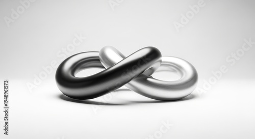 Interlocking Abstract Metal Links Forming an Infinity Symbol