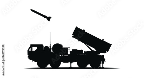 Military launcher firing a missile against a bright background silhouette