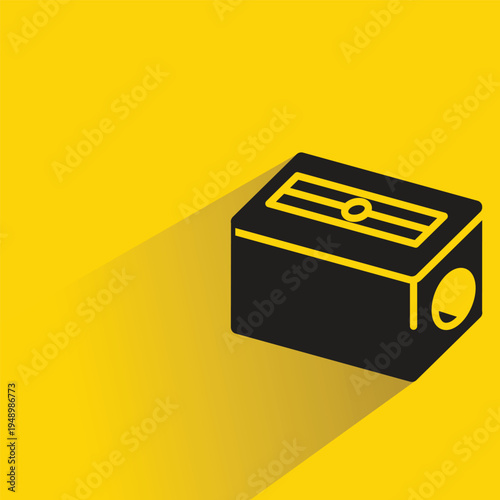 pencil sharpener with shadow on yellow background