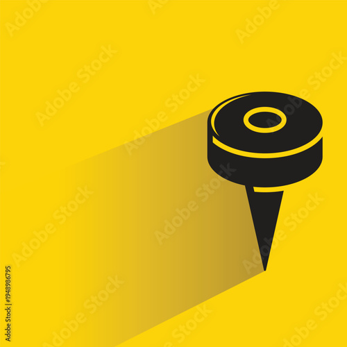 push pin icon with shadow on yellow background