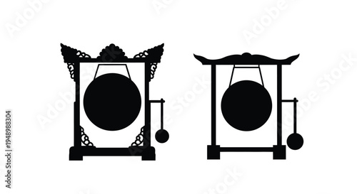 Two traditional gongs depicted in a striking black silhouette